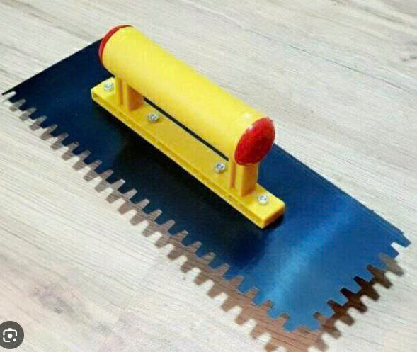 Bay trét thép 11x30cm, cán nhựa, loại răng cưa